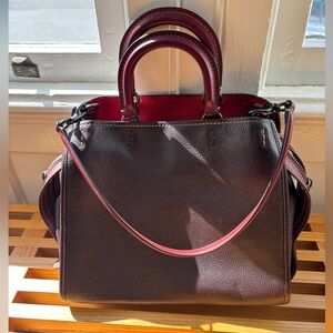 COACH legacy women’s leather tote in rich burgundy pebbled leather. $85